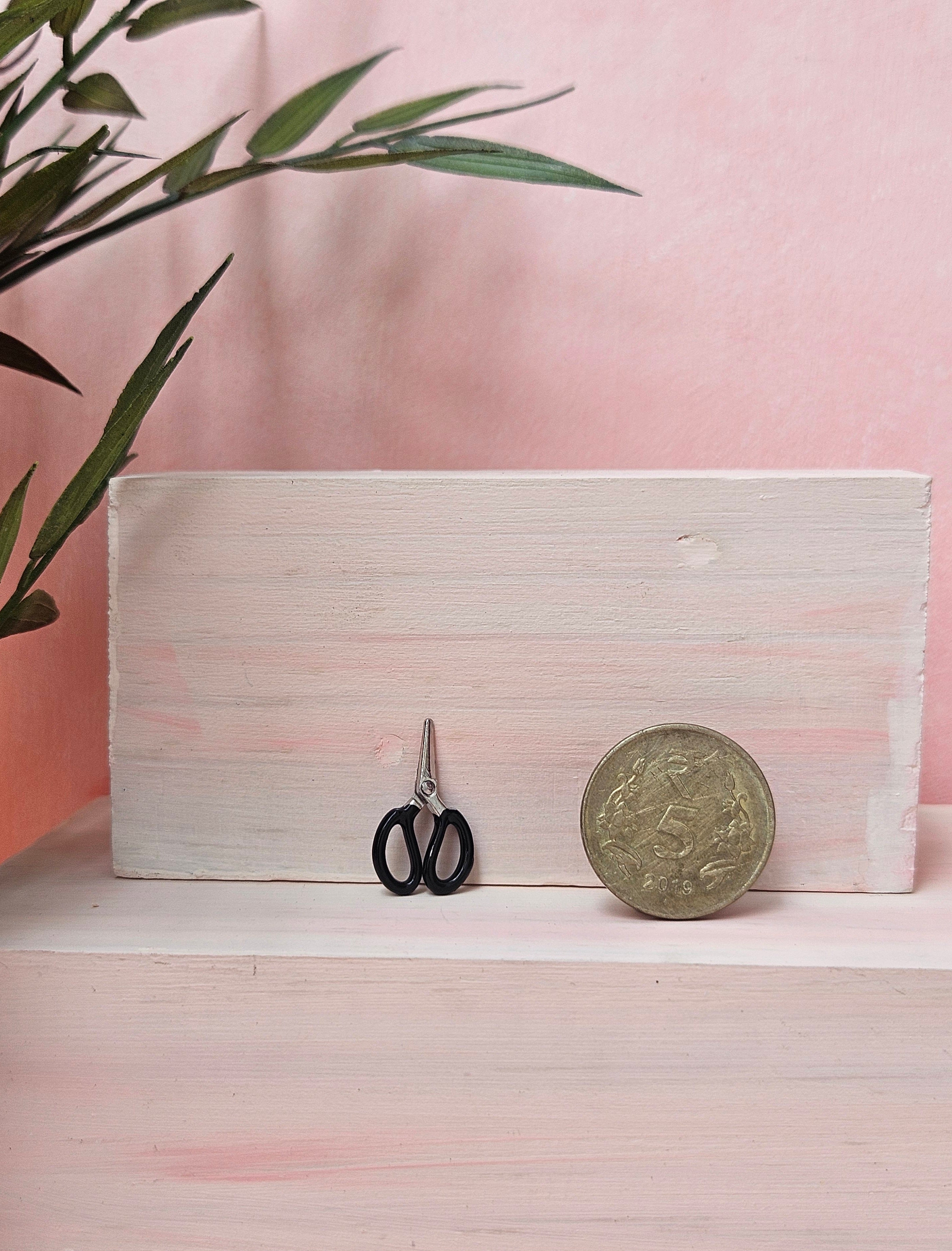 Miniature black scissor collectible dollhouse tool for hobbyists and miniaturists in India.