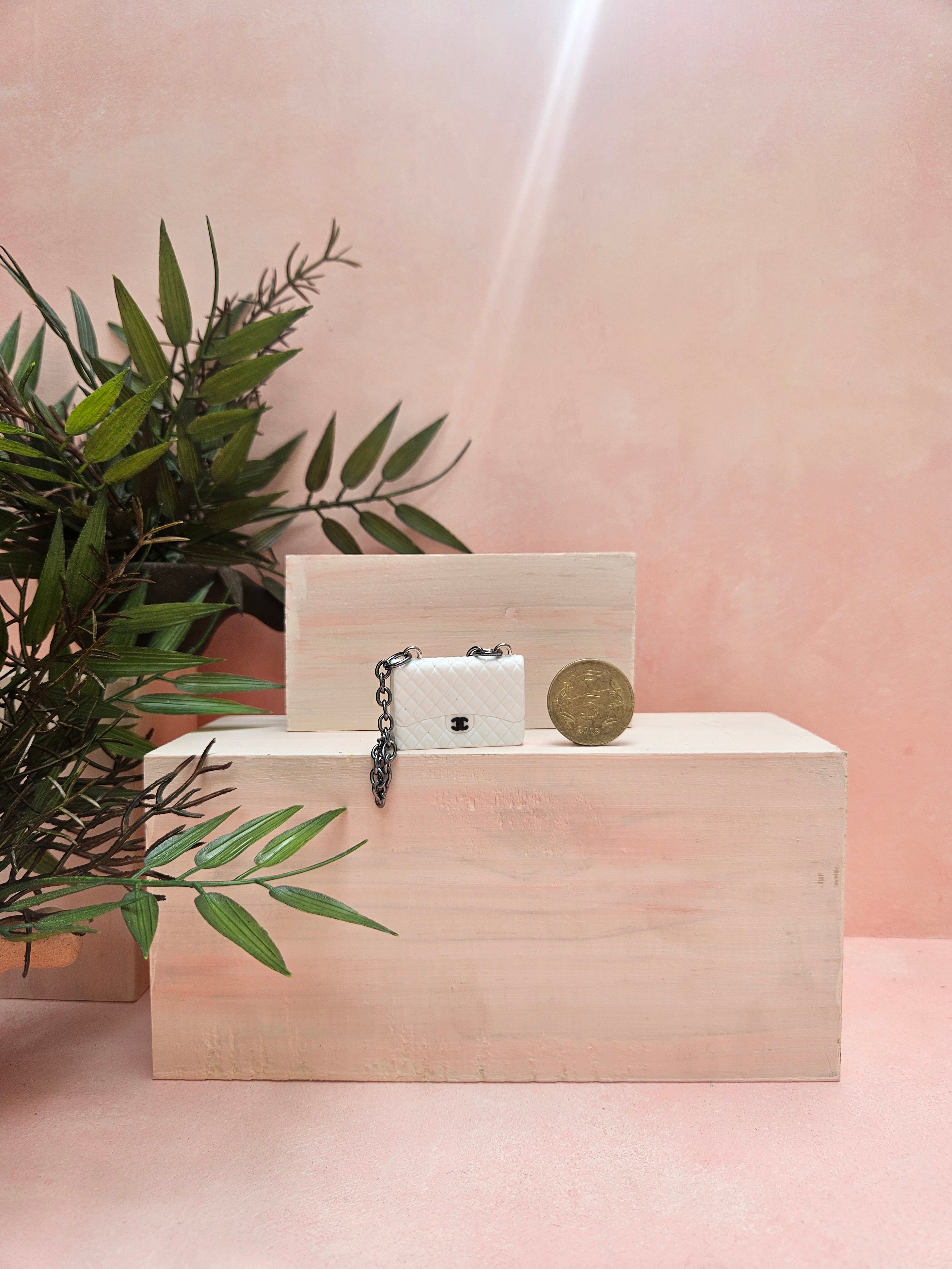 Discover a beautifully crafted Miniature Handbag with realistic detailing. Ideal for dollhouse accessories, collectibles, décor accents, or unique gifting.
