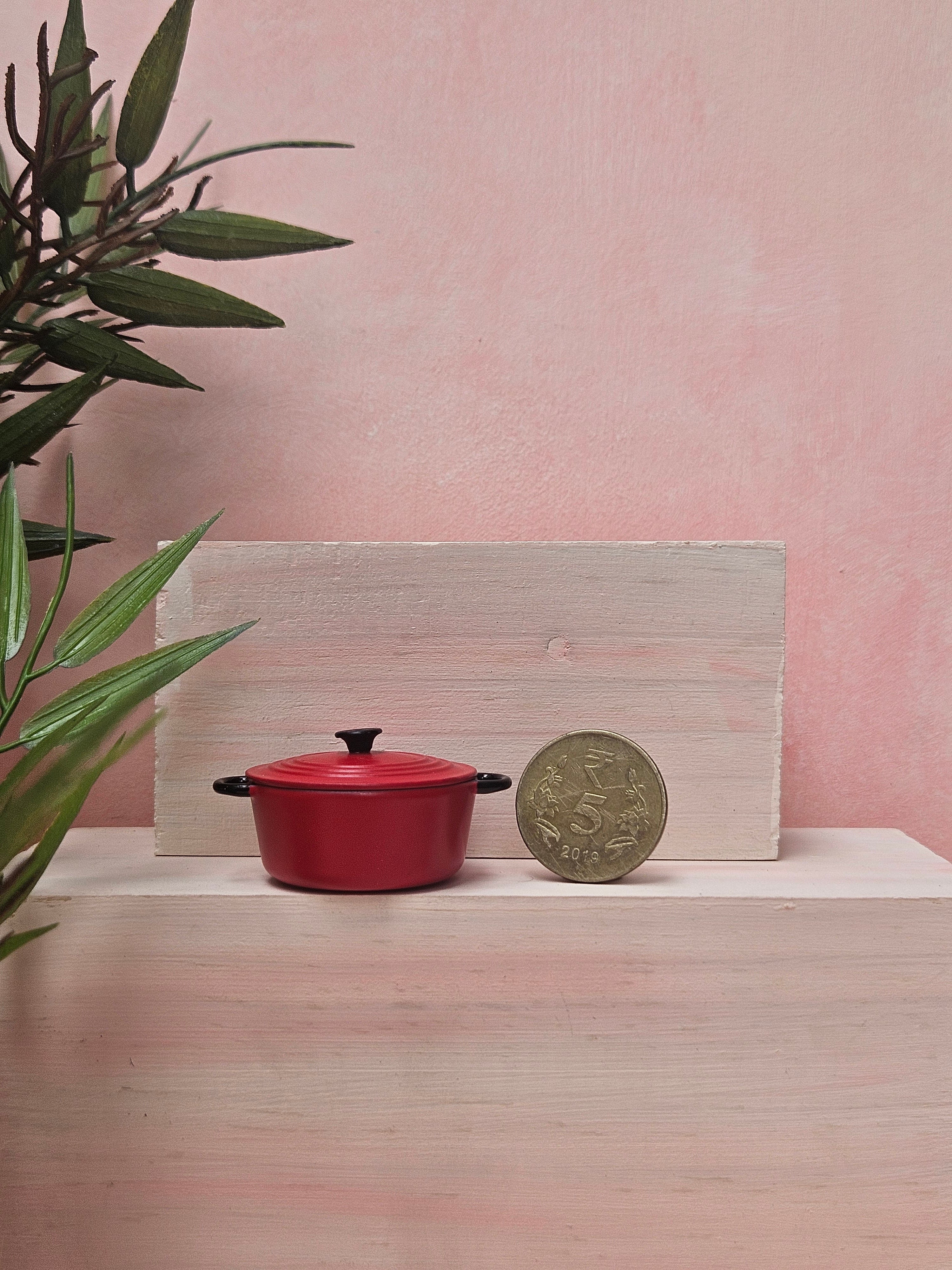 "Tiny serving pan collectible for dollhouse cooking scene"
