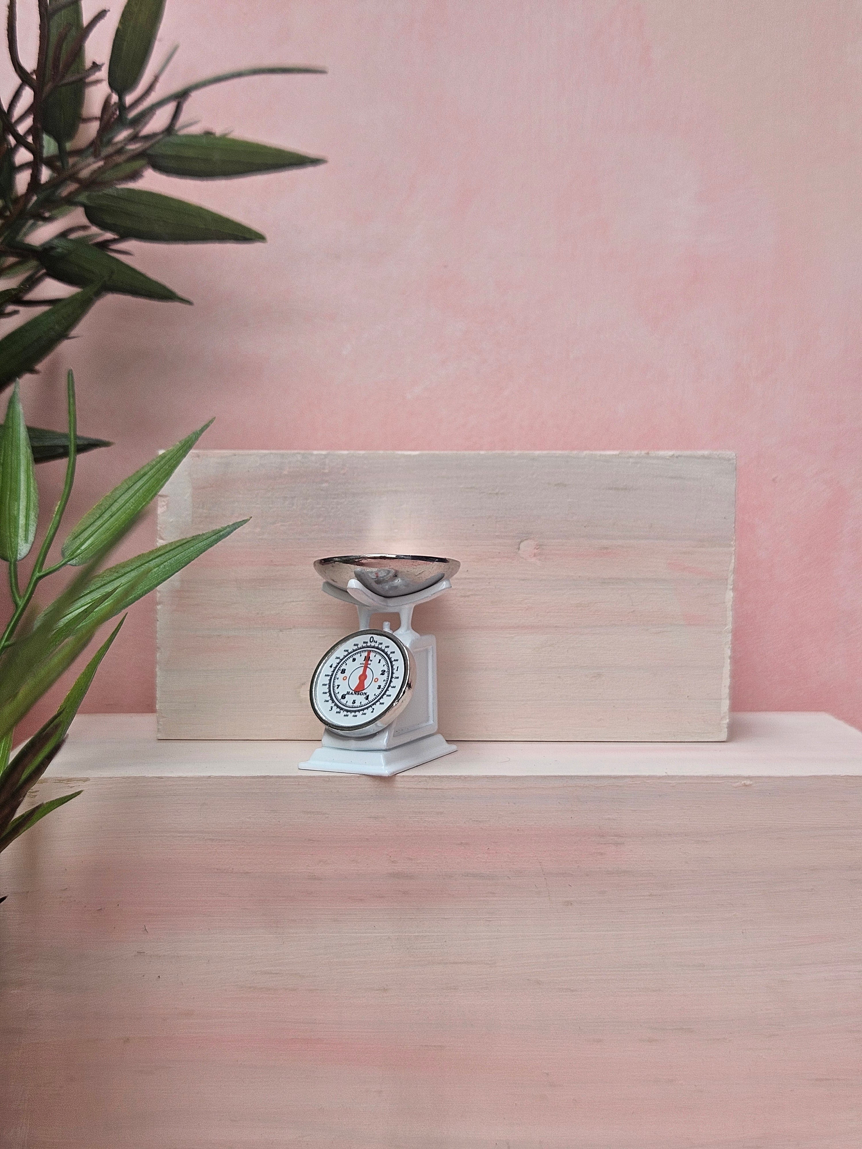 "Miniature weighing scale collectible for dollhouse and diorama"