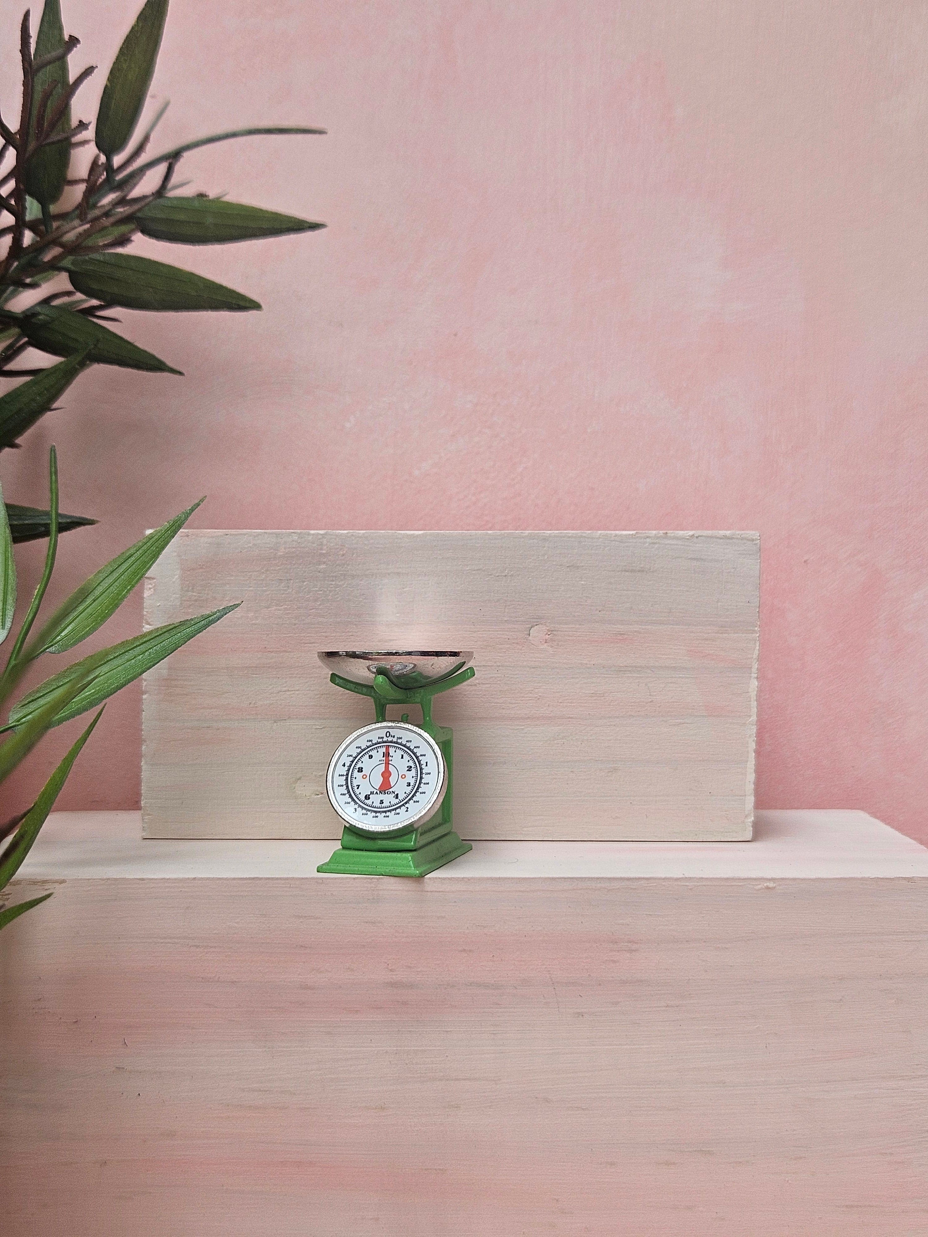 "Miniature weighing scale collectible for dollhouse and diorama"