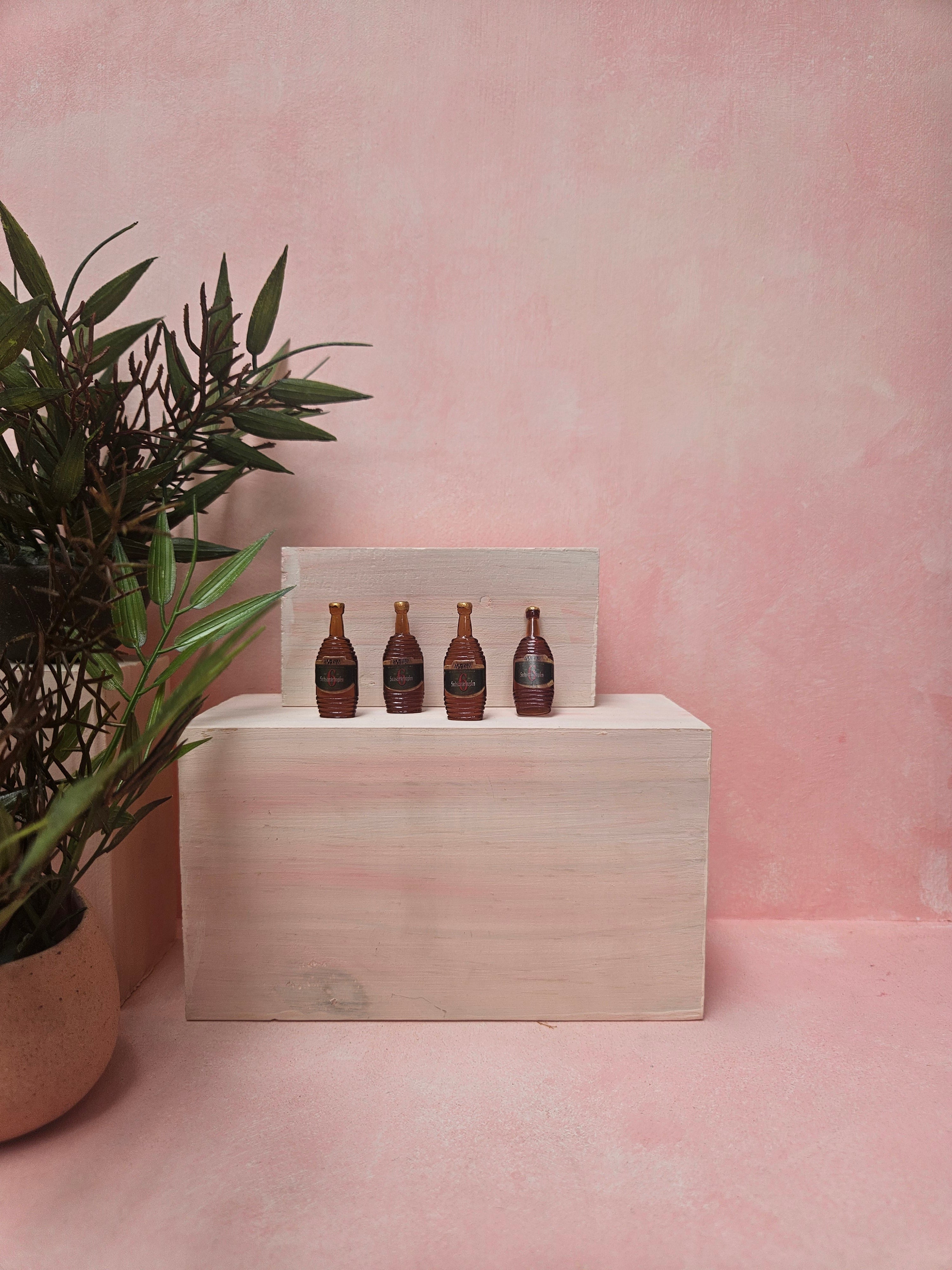 "Miniature alcohol bottles collectible for dollhouse bar setup"