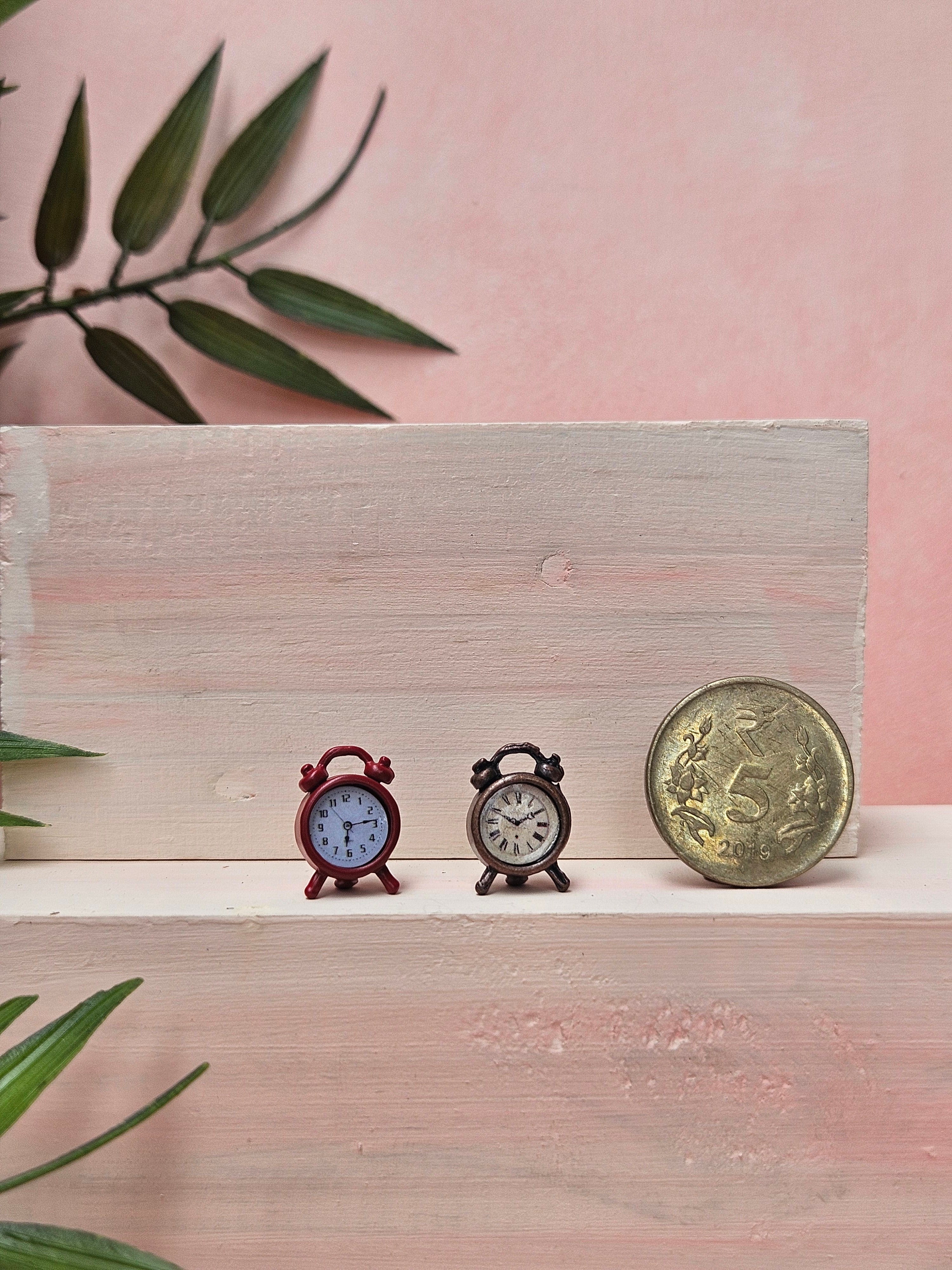 Miniature red and bronze vintage alarm clock collectible gift with detailed tiny décor design.