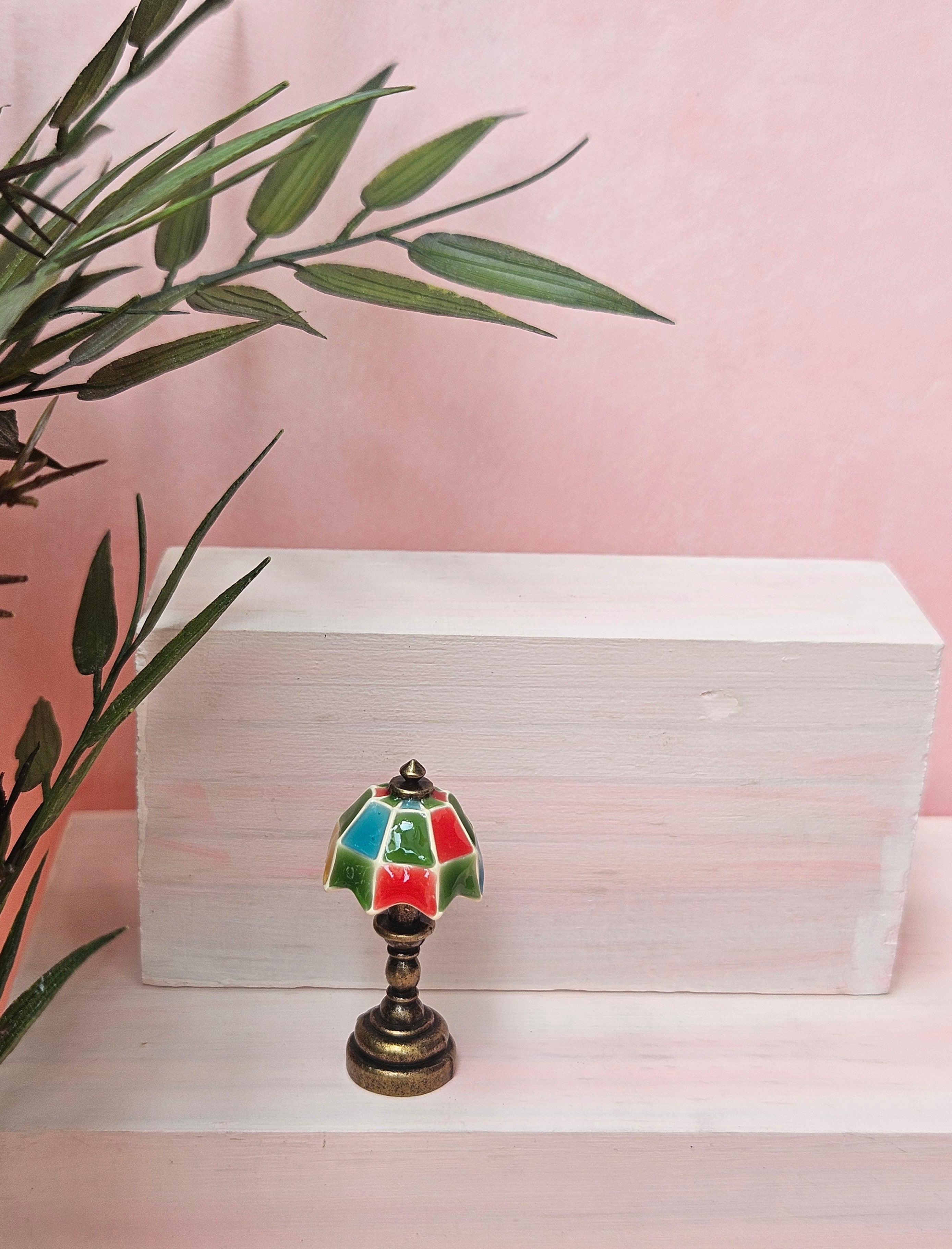 Miniature vintage lamp collectible prop for dollhouse and crafts in India.