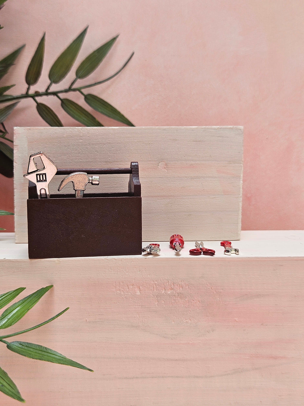 Miniature toolkit with realistic tiny tools for dollhouse décor and collectibles.