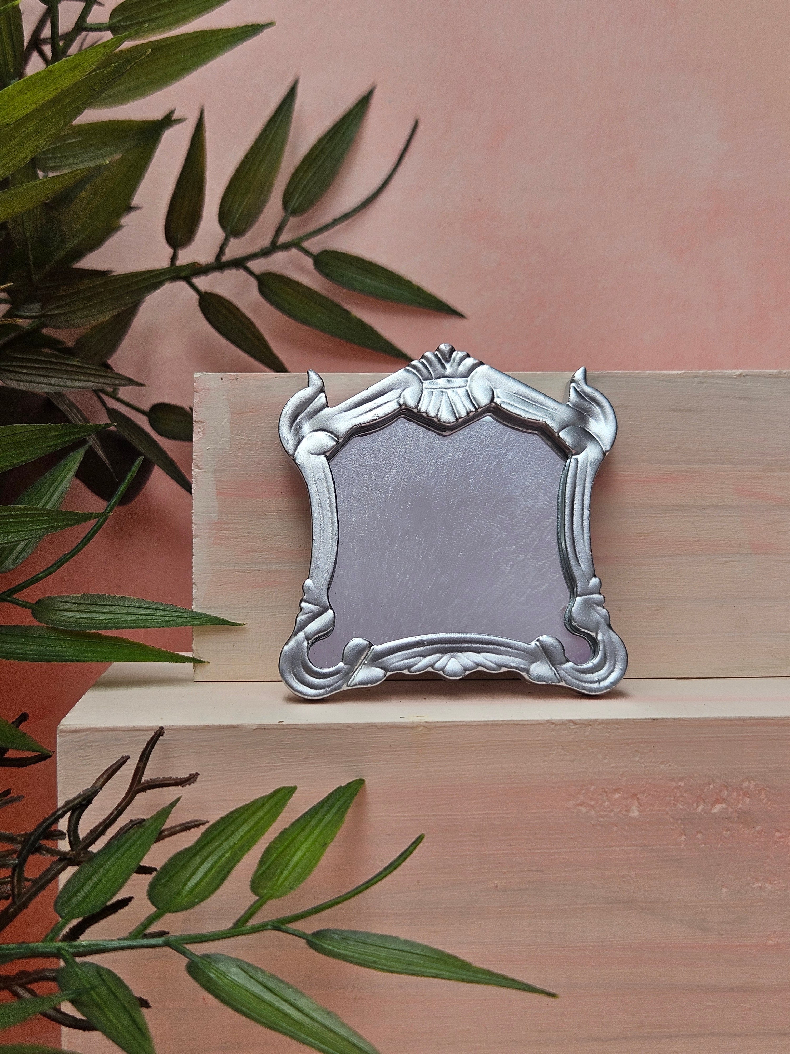 Miniature wall hanging mirror with elegant design for décor projects and collectible gifts in India