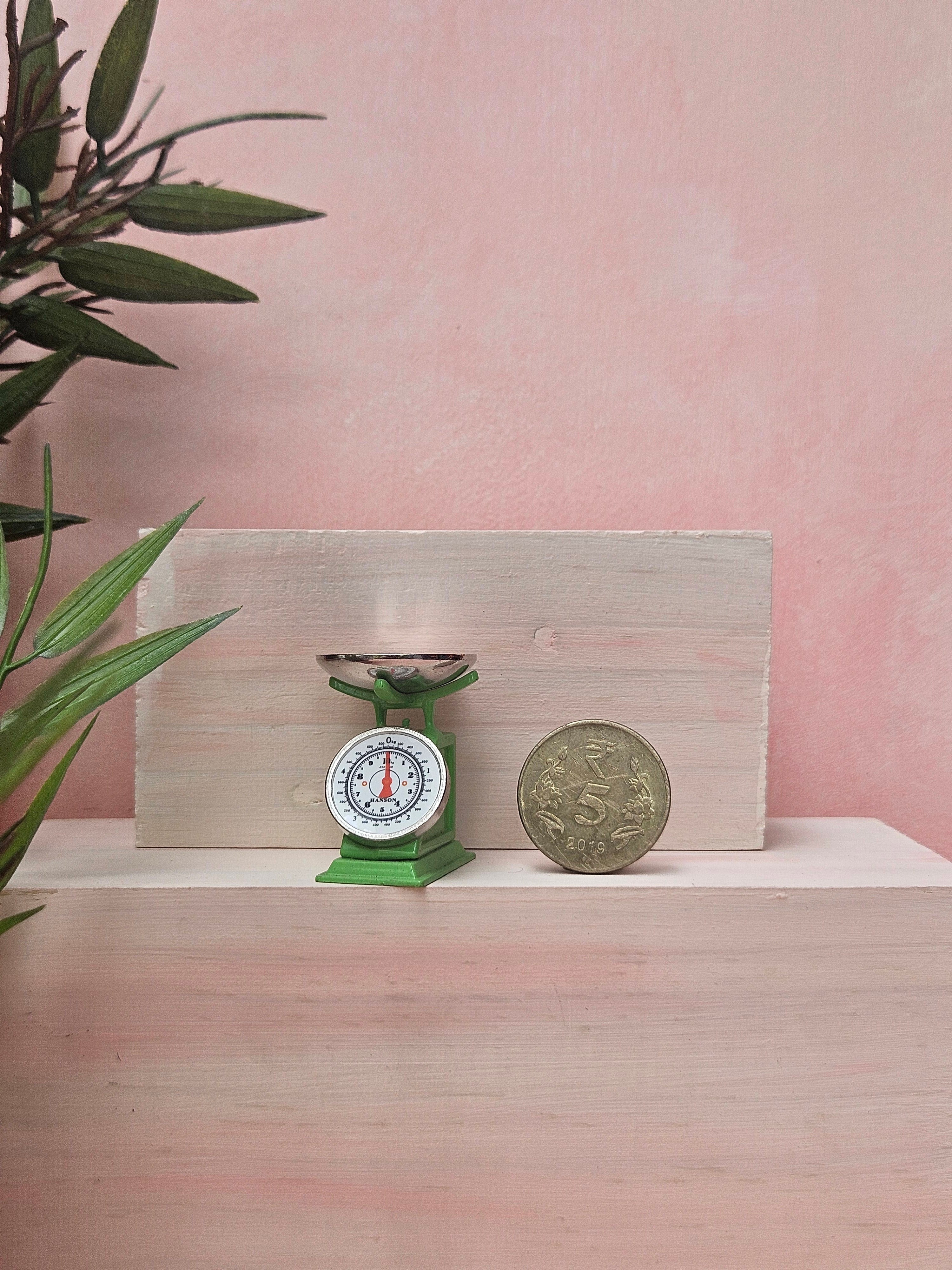 "Miniature weighing scale collectible for dollhouse and diorama"